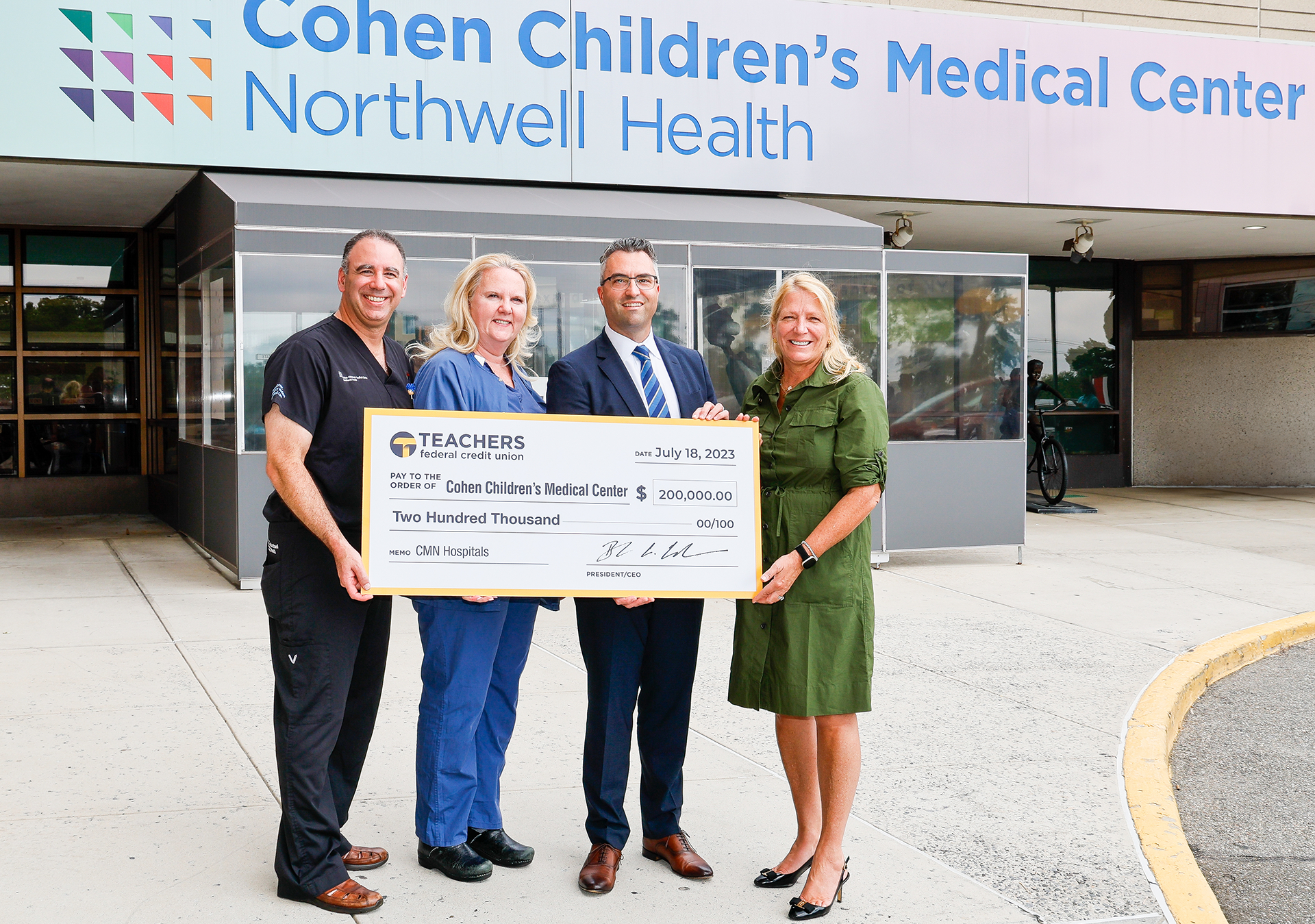 Large Teachers check presented to Cohen Children's Hospital staff.