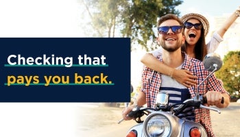 Man and woman riding a motorcycle, excited to learn about a high-yield checking account.
